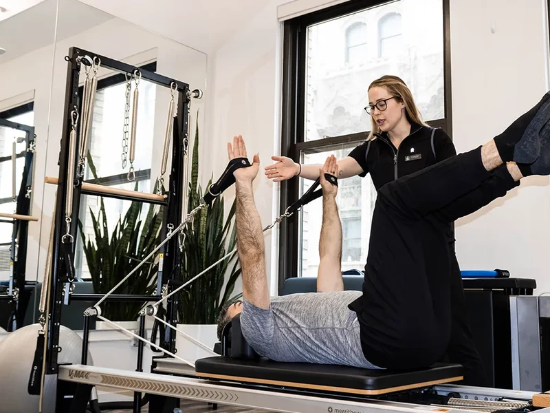 Therapist working one on one with a patient